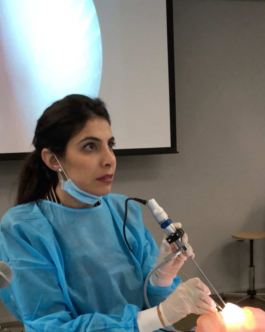 Dr Hiba performing a procedure on a training dummy